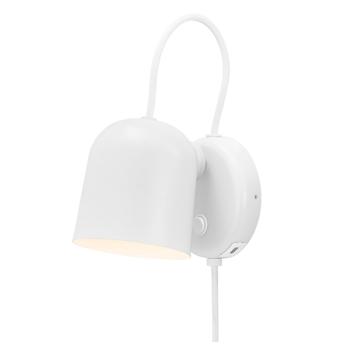 A white wall-mounted lamp with a curved arm and a bell-shaped shade, casting a warm light.