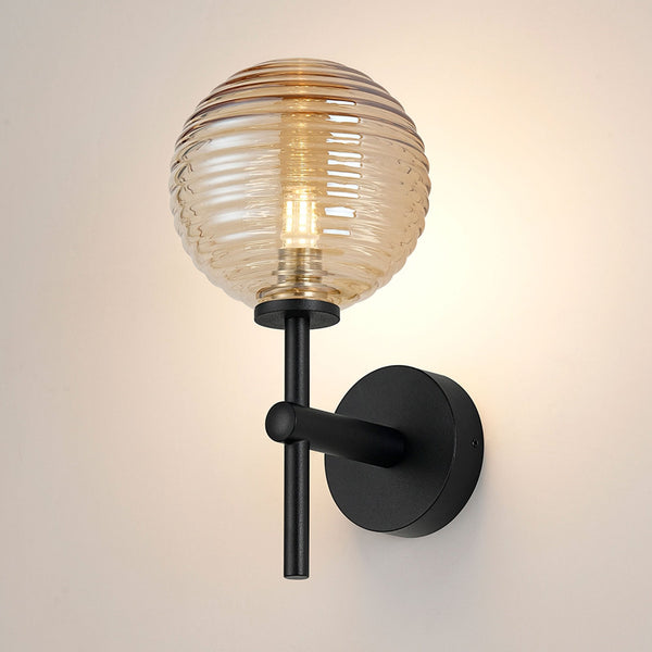 Tenterden Medium Arm IP44 Wall Light in Satin Black with Ribbed Round Amber Glass Diffuser