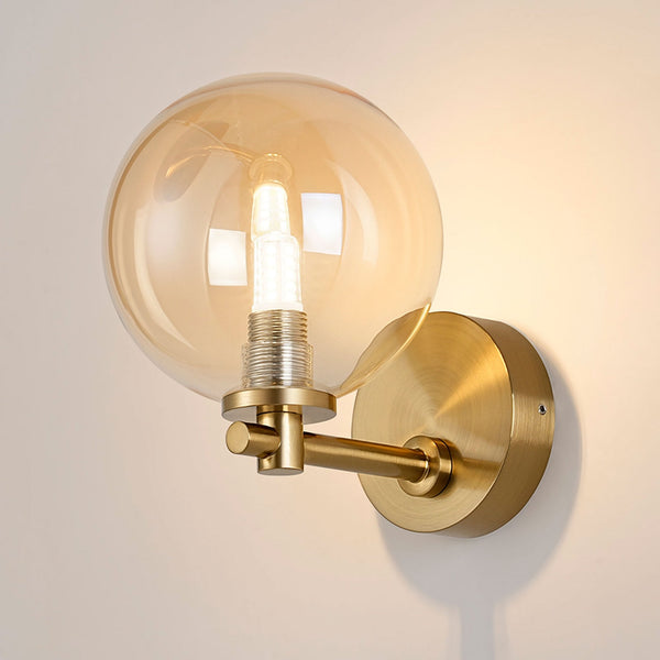 Tenterden Short Arm IP44 Wall Light in Brass Gold with Smooth Round Amber Glass Diffuser