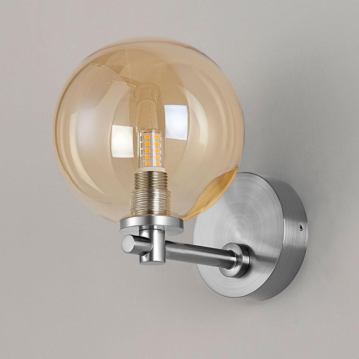 Tenterden Short Arm IP44 Wall Light in Chrome with Smooth Round Amber Glass Diffuser