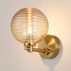 Tenterden Short Arm IP44 Wall Light in Brass Gold with Ribbed Round Amber Glass Diffuser