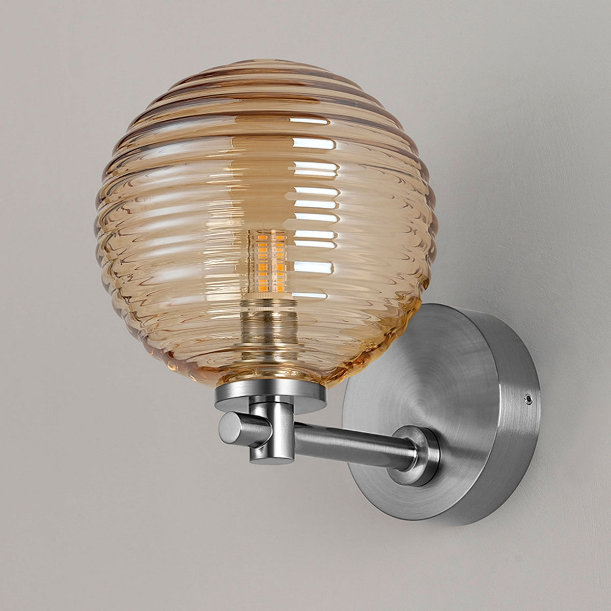 Tenterden Short Arm IP44 Wall Light in Chrome with Ribbed Round Amber Glass Diffuser