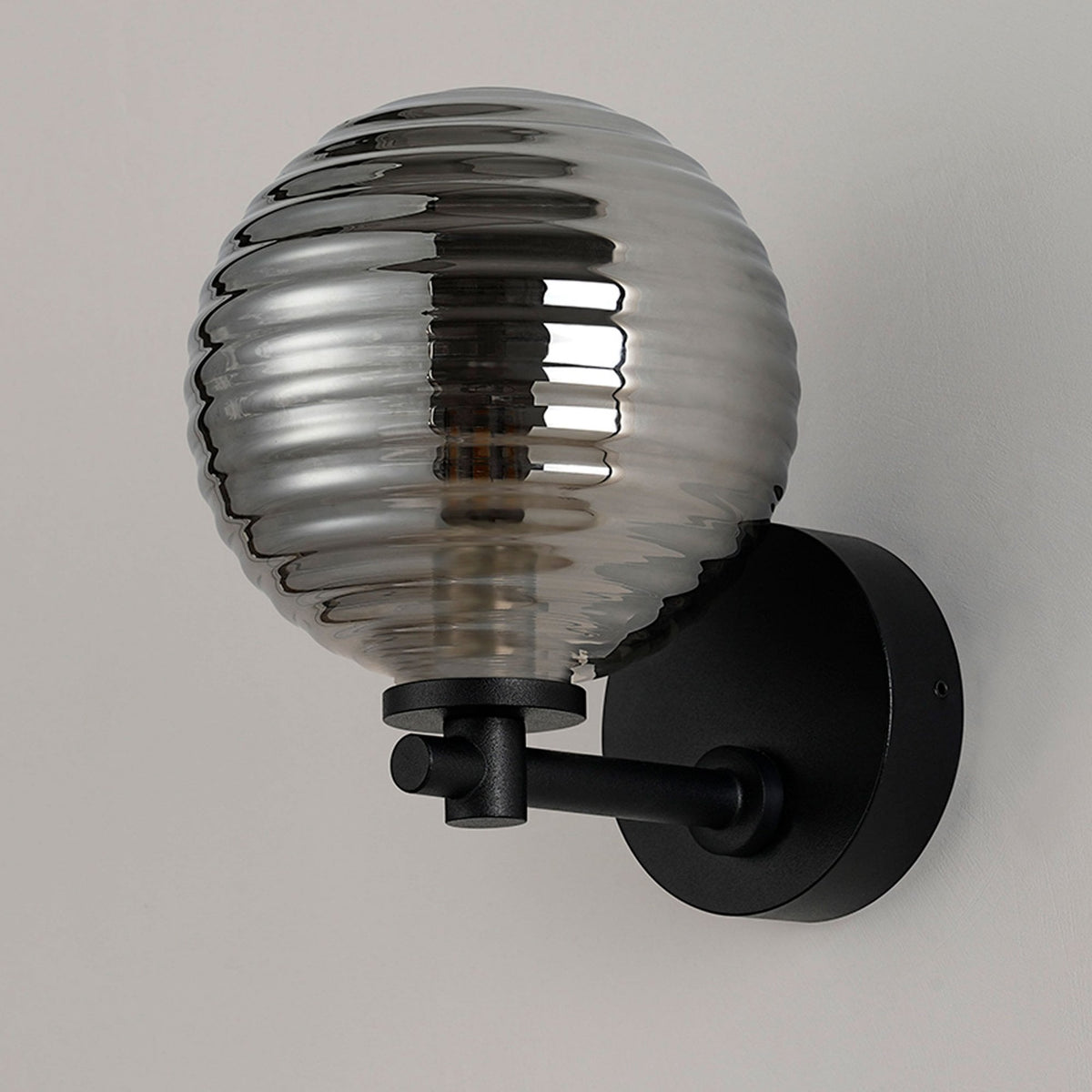 Tenterden Short Arm IP44 Wall Light in Satin Black with Ribbed Round Smoke Glass Diffuser