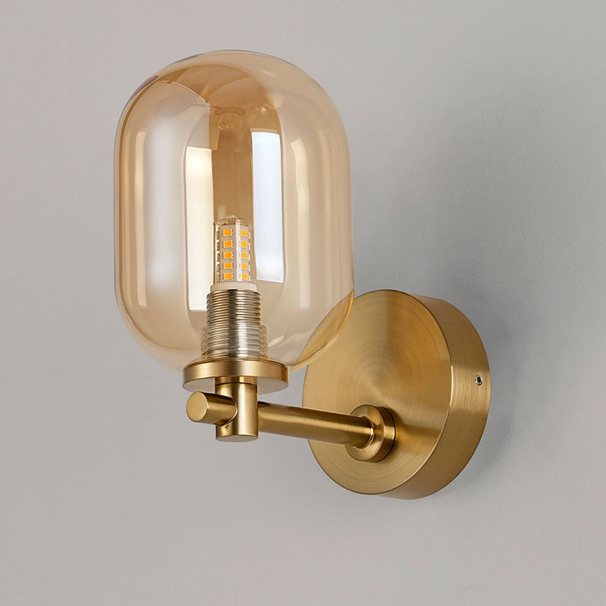 Tenterden Short Arm IP44 Wall Light in Brass Gold with Smooth Tubular Amber Glass Diffuser
