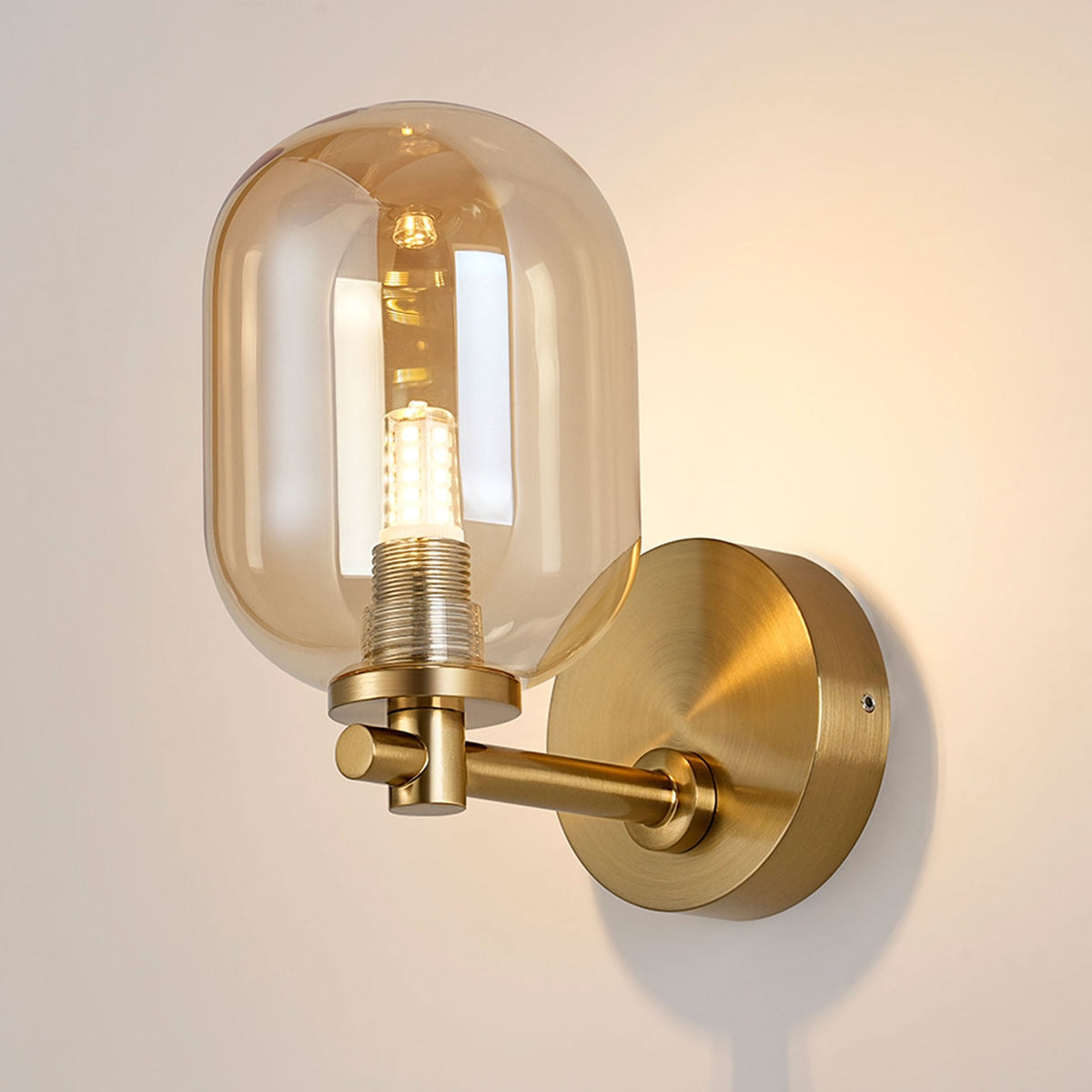 Tenterden Short Arm IP44 Wall Light in Brass Gold with Smooth Tubular Amber Glass Diffuser