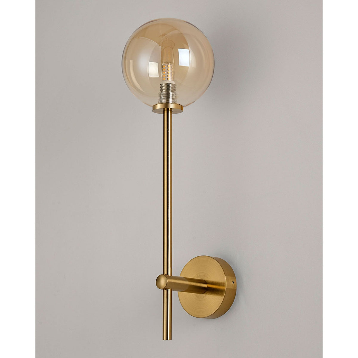 Tenterden Tall Arm IP44 Wall Light in Brass Gold with Smooth Round Amber Glass Diffuser