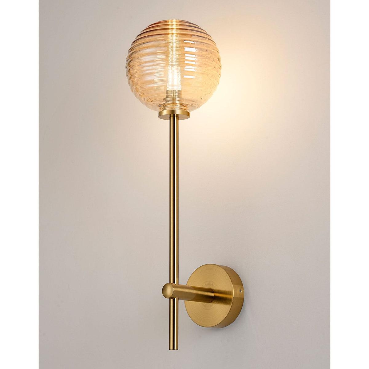 Tenterden Tall Arm IP44 Wall Light in Brass Gold with Ribbed Round Amber Glass Diffuser