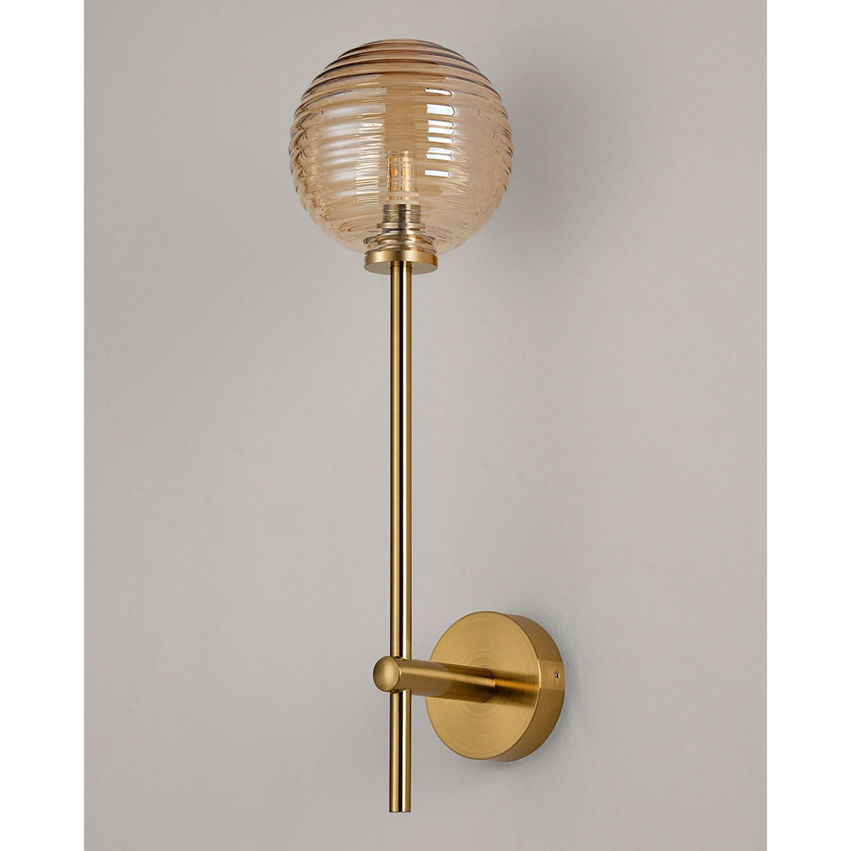 Tenterden Tall Arm IP44 Wall Light in Brass Gold with Ribbed Round Amber Glass Diffuser