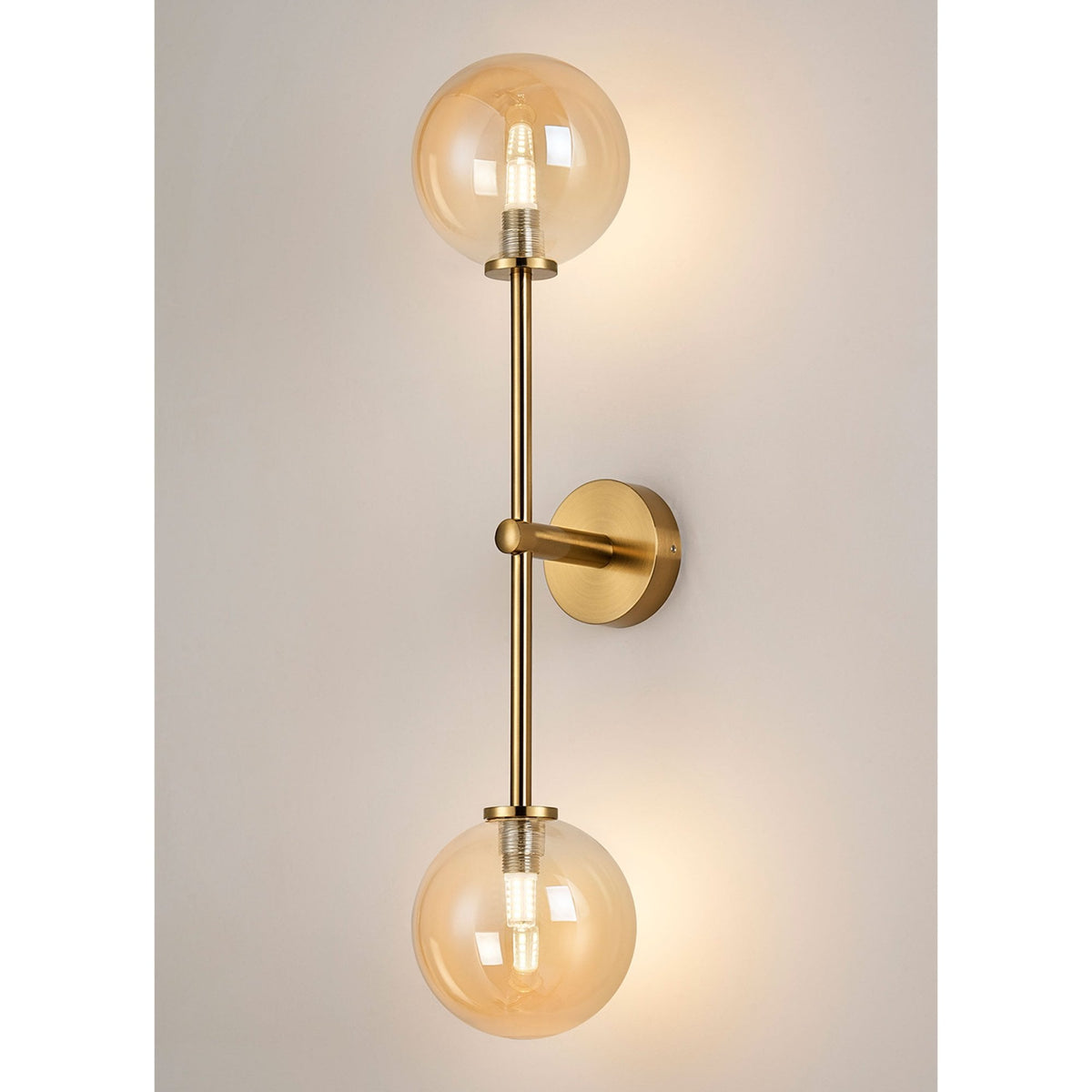 Tenterden Tall Twin Arm IP44 Wall Light in Brass Gold with Smooth Round Amber Glass Diffusers