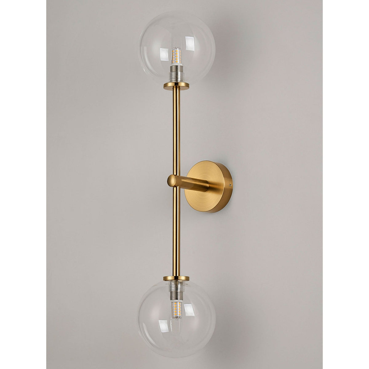 Tenterden Tall Twin Arm IP44 Wall Light in Brass Gold with Smooth Round Clear Glass Diffusers