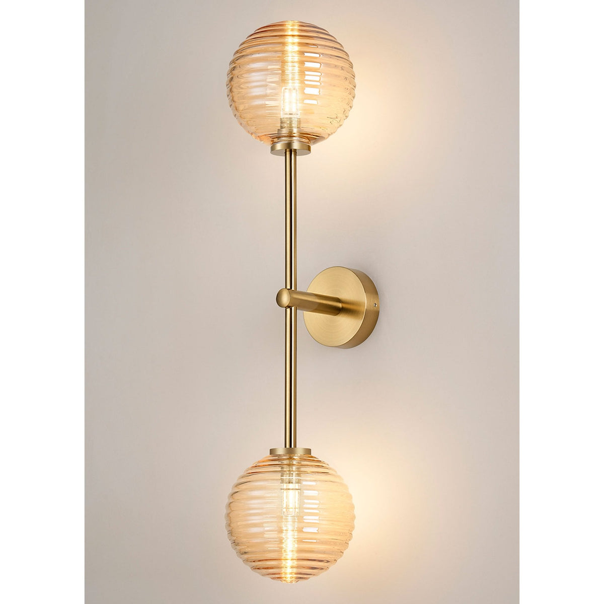 Tenterden Tall Twin Arm IP44 Wall Light in Brass Gold with Ribbed Round Amber Glass Diffusers