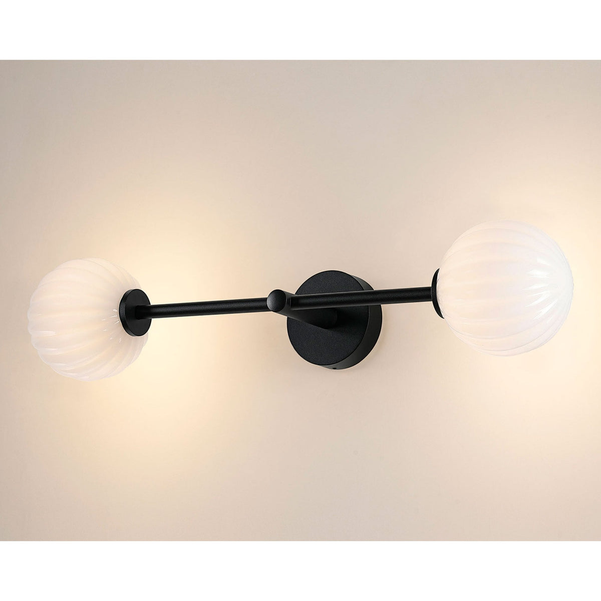 A horizontal black wall light with two ribbed white globe shades.