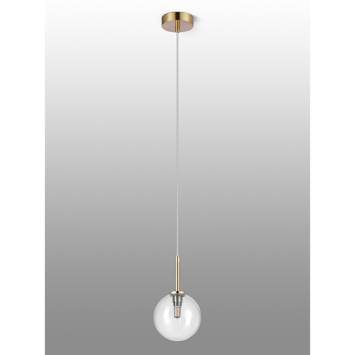 Gold and clear glass sphere pendant light with a lit bulb, against a gradient background.