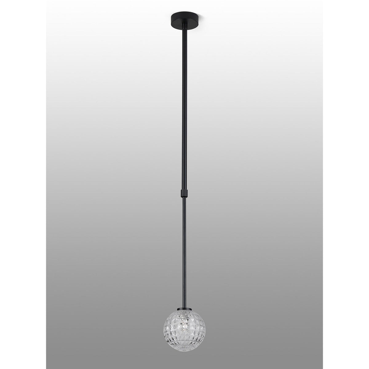 Black pendant light with a textured glass globe against a gradient grey background.