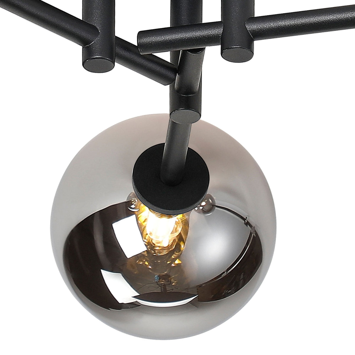 Close-up of the central sphere and black frame of a modern ceiling light.