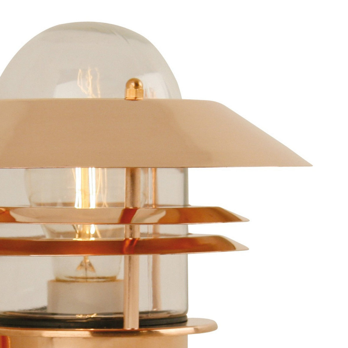 A detailed view of the top of the copper outdoor wall light, highlighting the glass dome.
