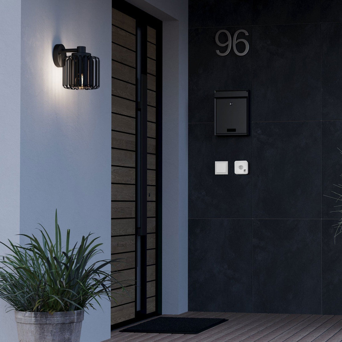 Selinus IP65 Outdoor Wall Light in Black with Clear Glass Shade
