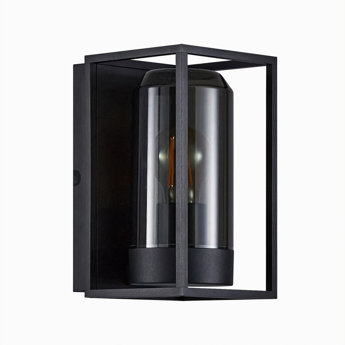 A black outdoor wall light with an unlit filament bulb inside.