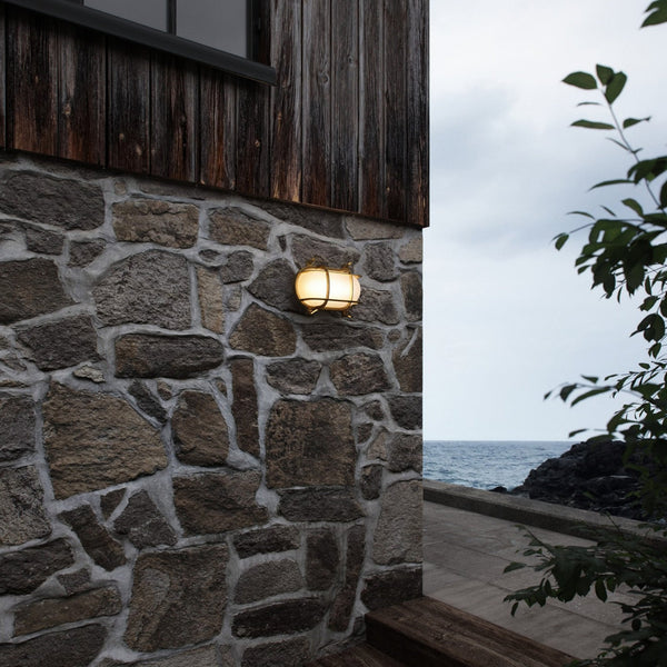 Helford Coastal IP64 Bulkhead Wall Light In Brass With Glass Shade