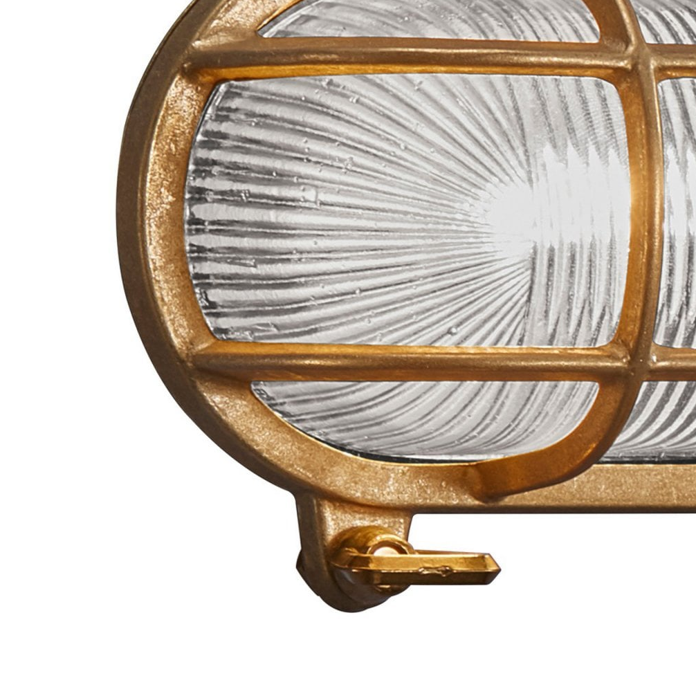Nordlux Helford brass bulkhead wall light with ribbed glass shade