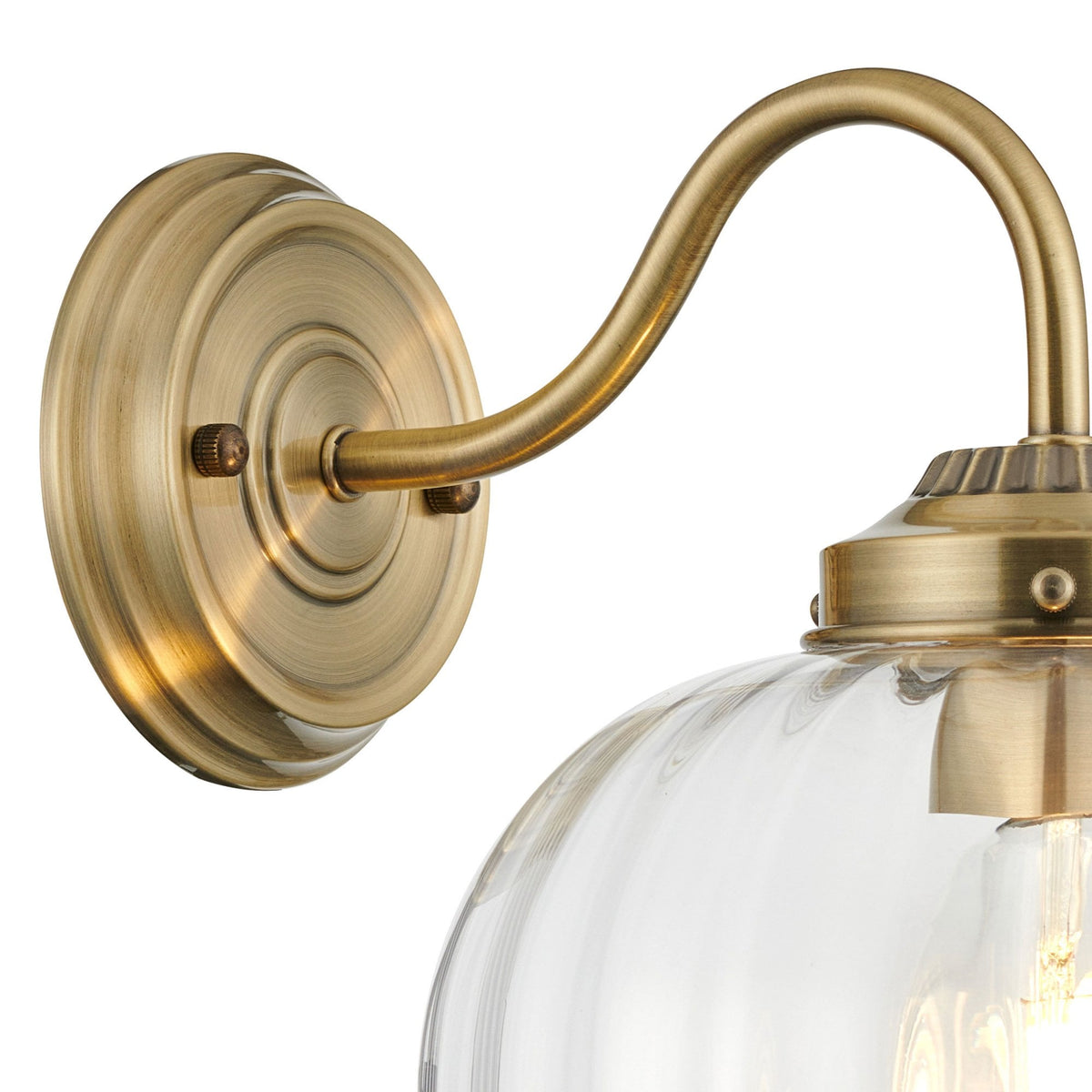 Appin Wall Light in Antique Brass with Clear Flower Bud Glass Shade