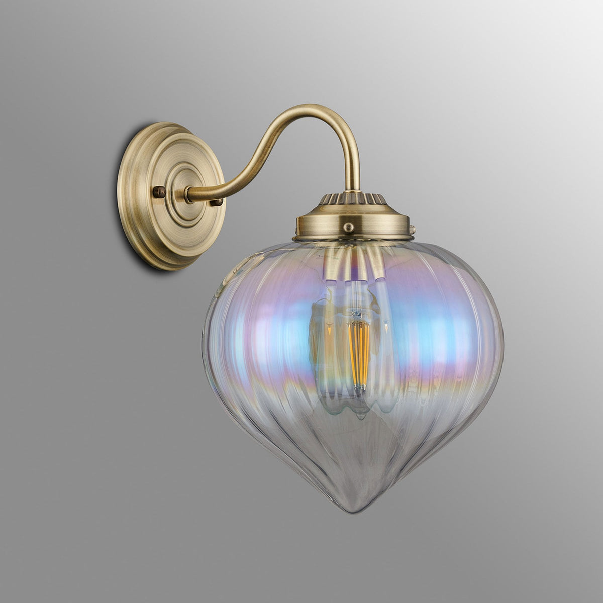 Appin Wall Light in Antique Brass with Iridescent Faded Flower Bud Glass Shade