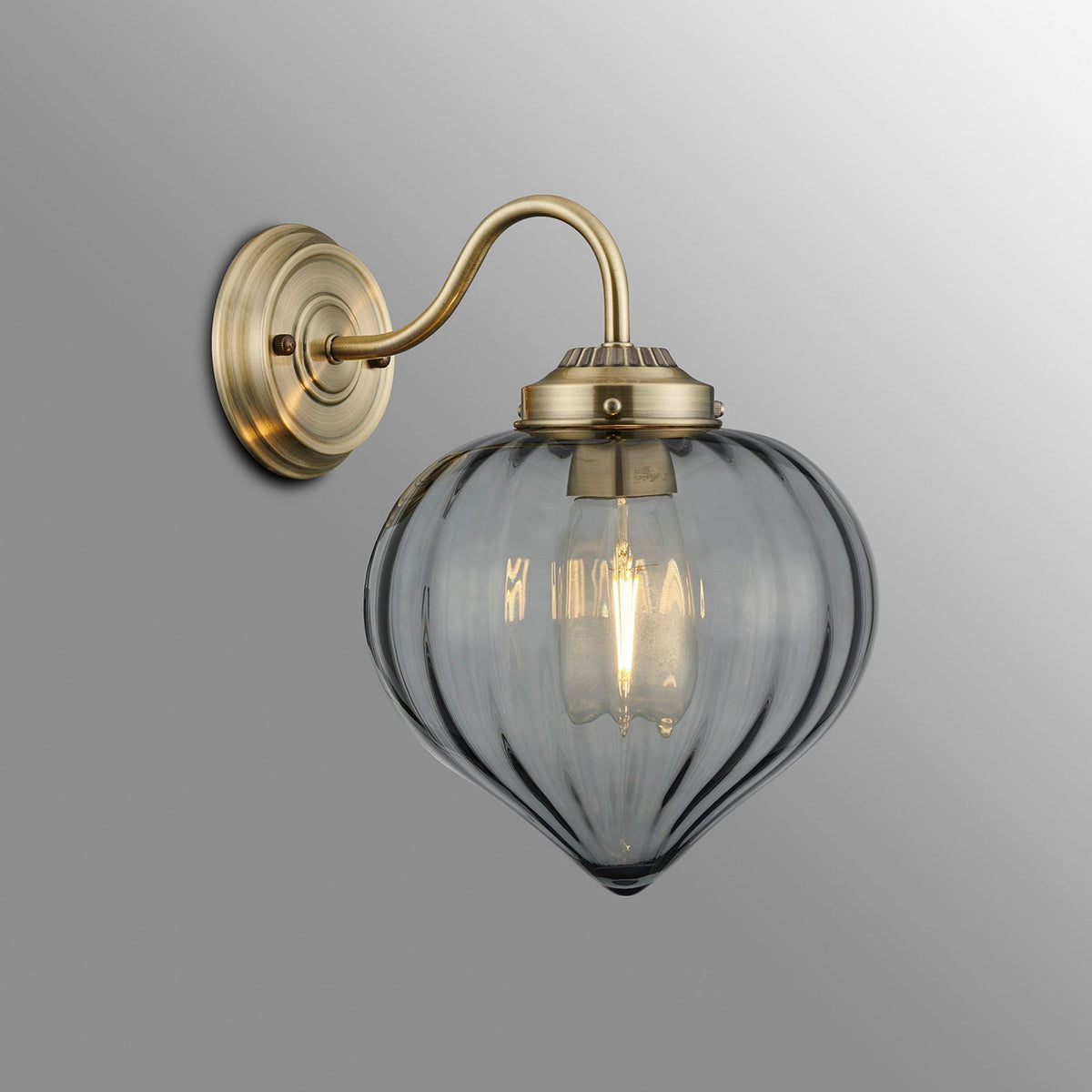 Appin Wall Light in Antique Brass with Smoke Flower Bud Glass Shade