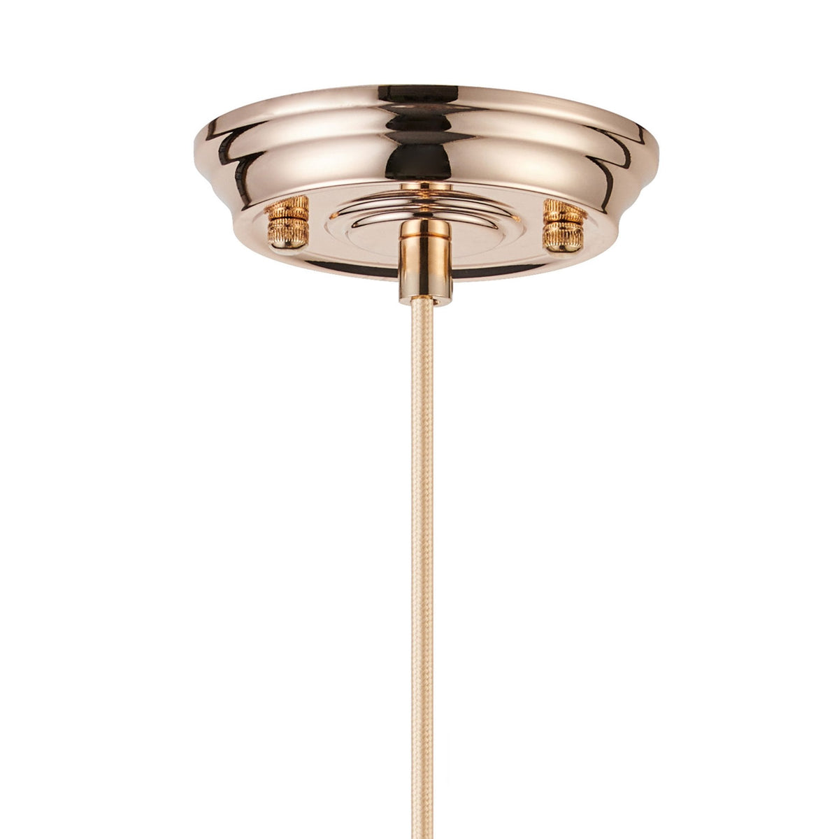 A close-up of the rose gold ceiling rose and braided cable of the pendant light.
