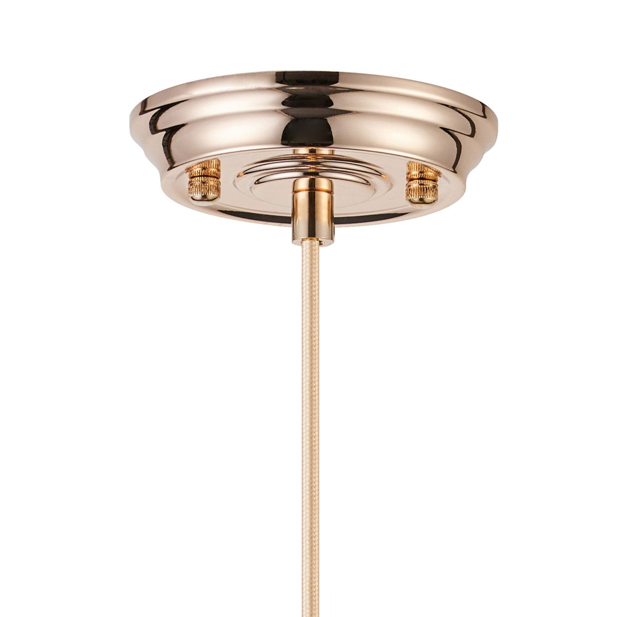 A close-up of a decorative gold-coloured ceiling rose with a beige wire.