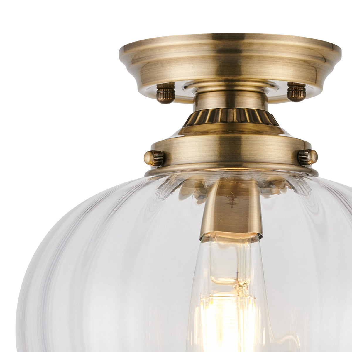 Appin Flush Ceiling Light in Antique Brass with Clear Flower Bud Glass Shade