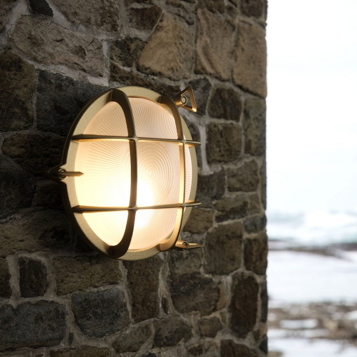 Polperro Coastal IP64 Bulkhead Wall Light In Brass With Glass Shade