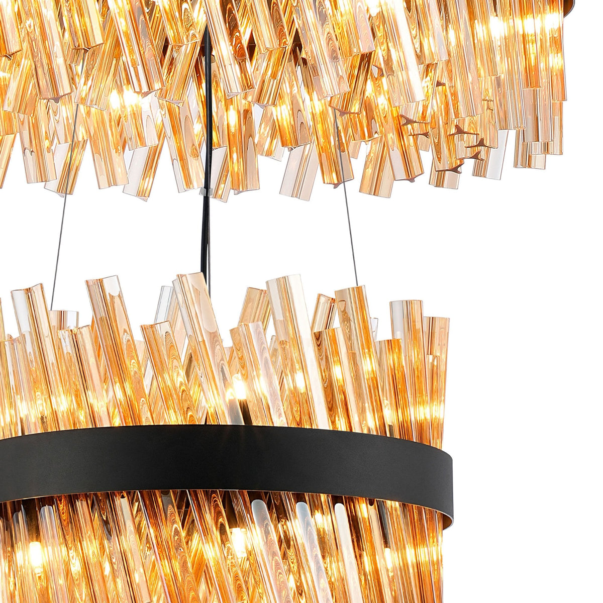 A close-up of a two-tier chandelier with amber glass rods and a black band.