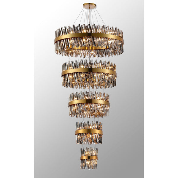 A luxurious tiered chandelier with golden bands and sparkling crystal rods, illuminated brightly.