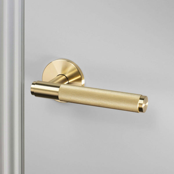 Cross Cut Knurled Door Handle Set In Brass