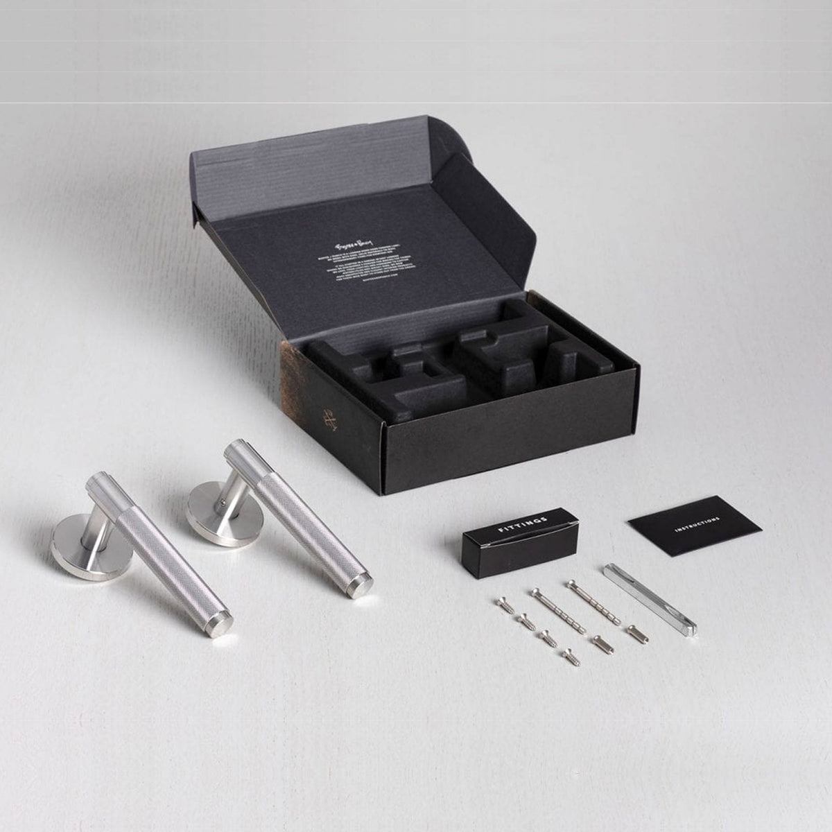 Cross Cut Knurled Door Handle Set In Solid Steel