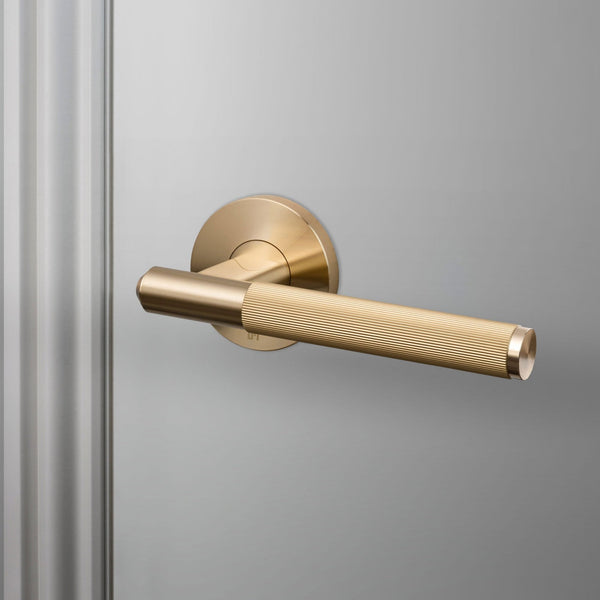 Linear Knurled Door Handle Set In Brass