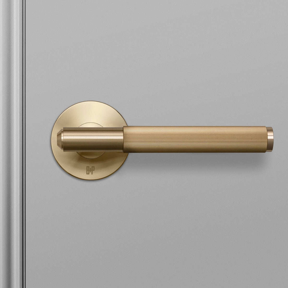 Linear Knurled Door Handle Set In Brass