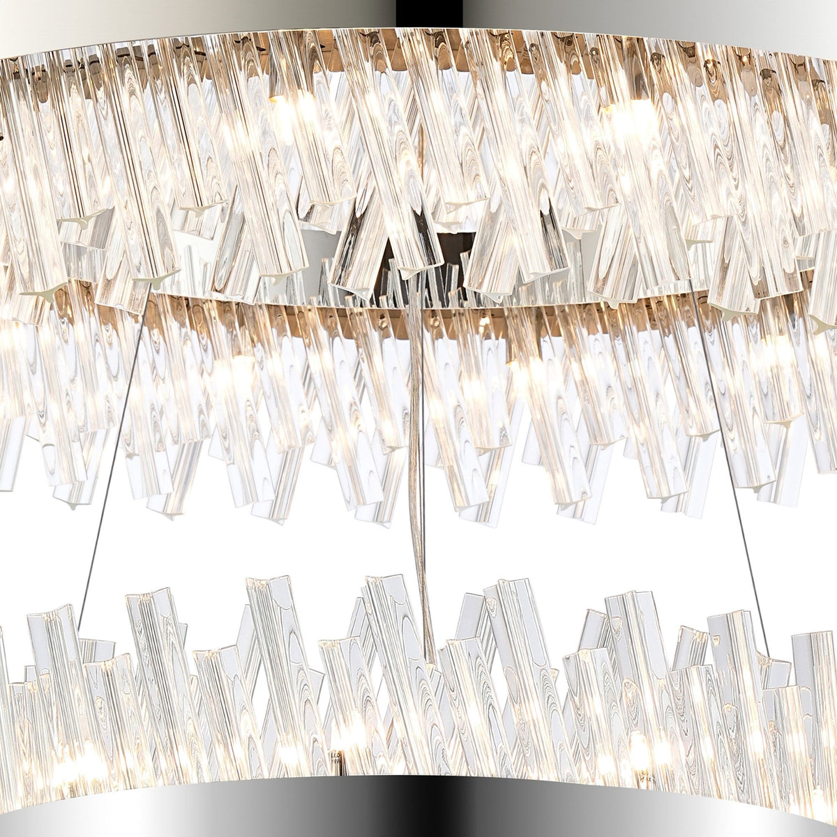 A close-up of a two-tiered chandelier with clear, rectangular crystal pieces.