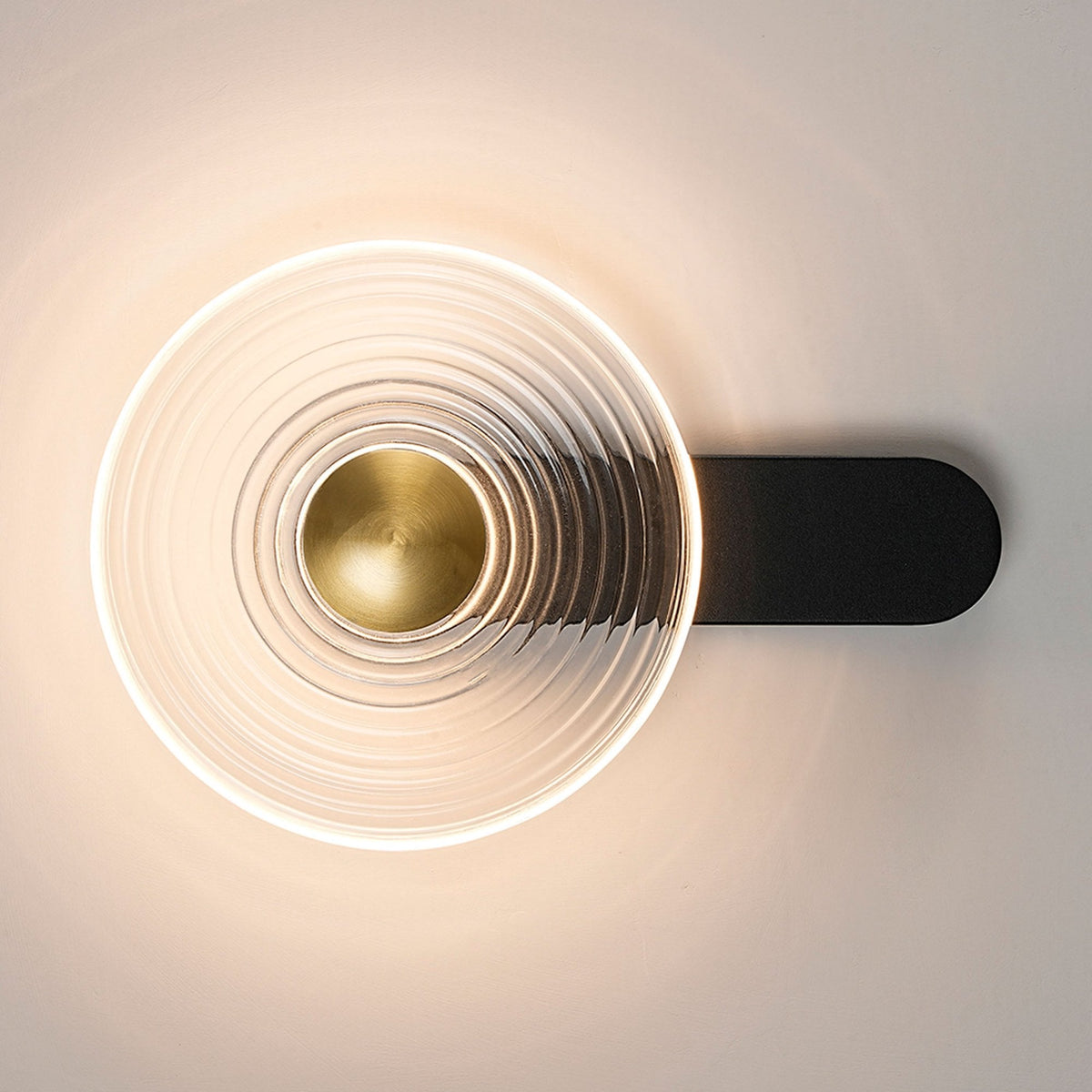 Irvine 7w LED Wall Light in Satin Black with Clear Ripple Glass Shade with Brass Cap