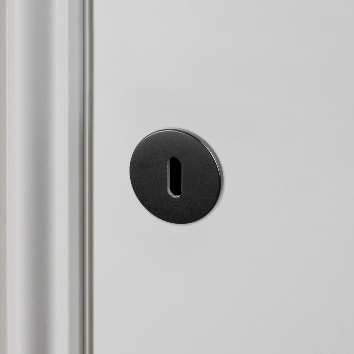 Pair of Indoor Key Escutcheons In Black