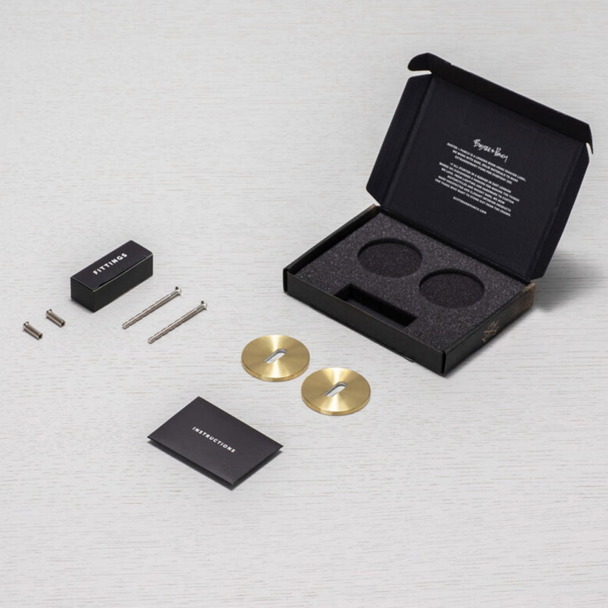 Pair of Indoor Key Escutcheons In Brass