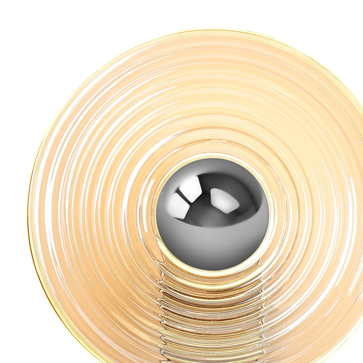 Close-up of a modern wall lamp's amber glass shade and central silver sphere, illuminated.