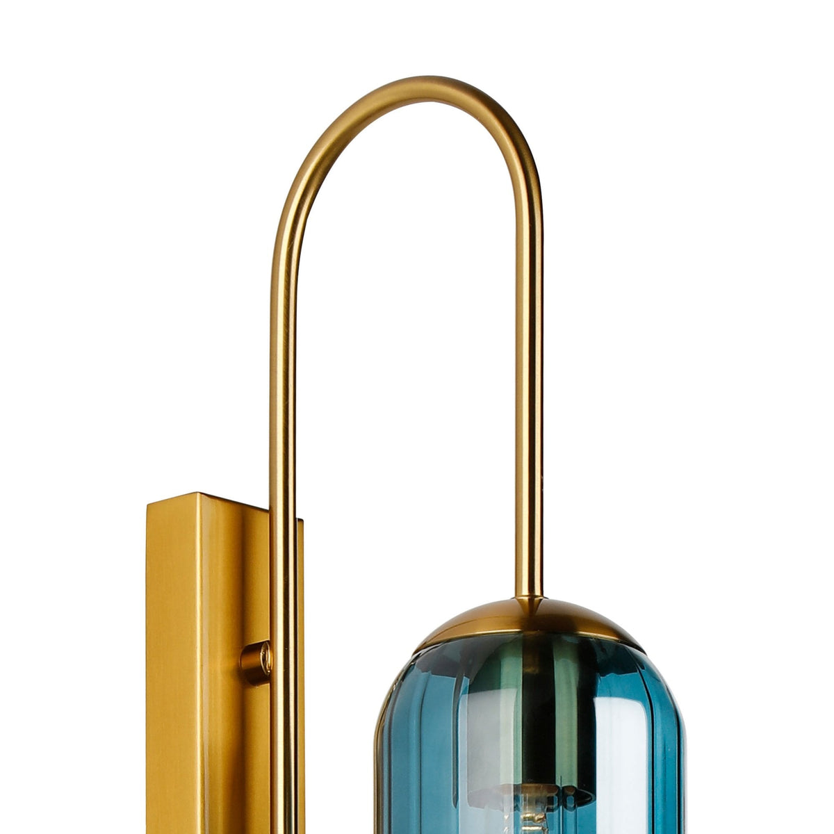 Close-up of the arched brass arm and top of the blue glass shade of a wall light.