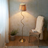Wriggle Floor Lamp in Brushed Aged Brass with a Wrapped Raffia Shade