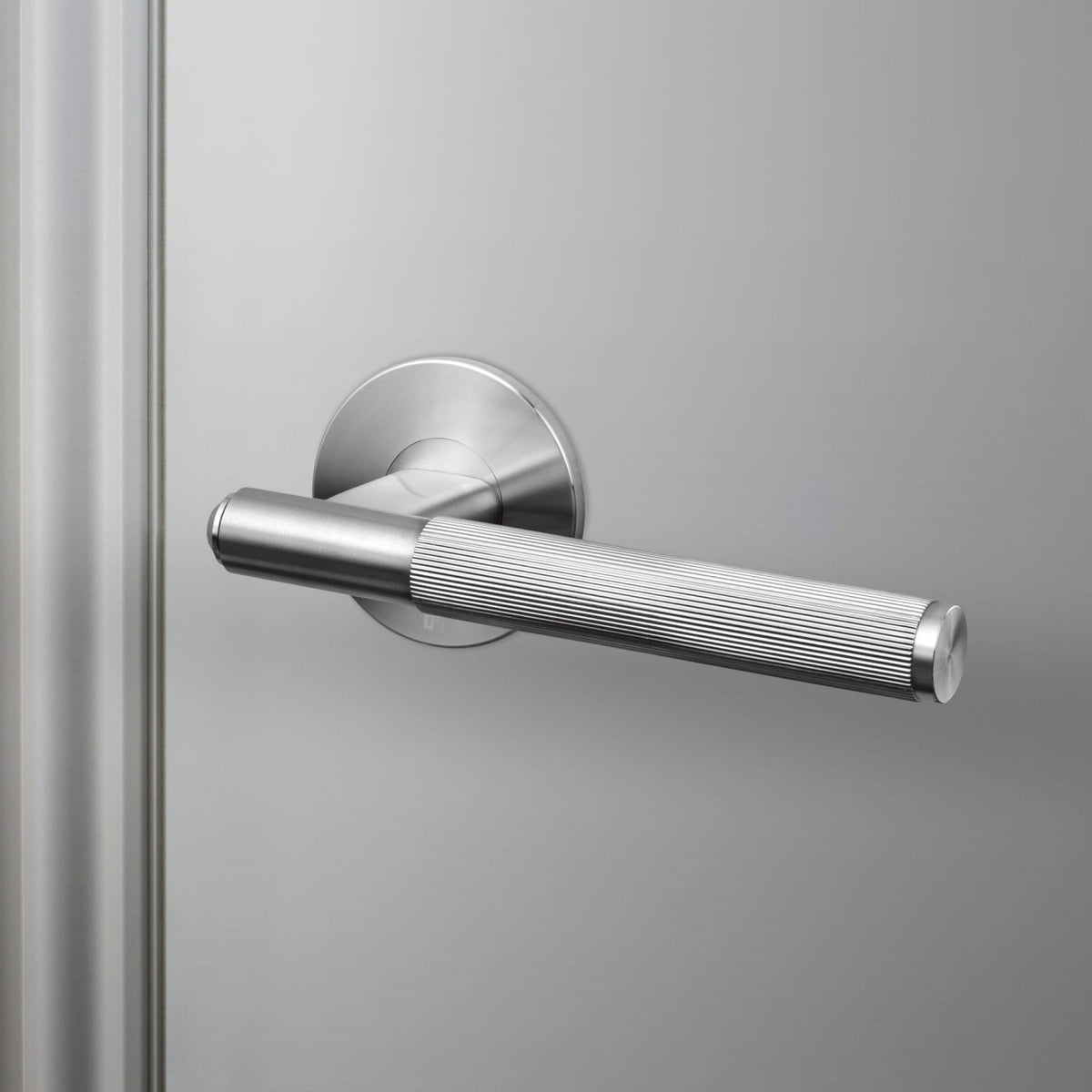 Linear Knurled Single Fixed Door Handle In Steel
