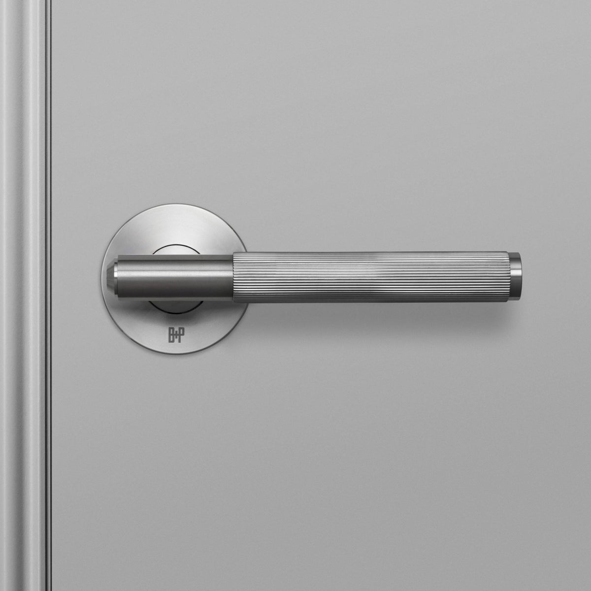 Linear Knurled Single Fixed Door Handle In Steel