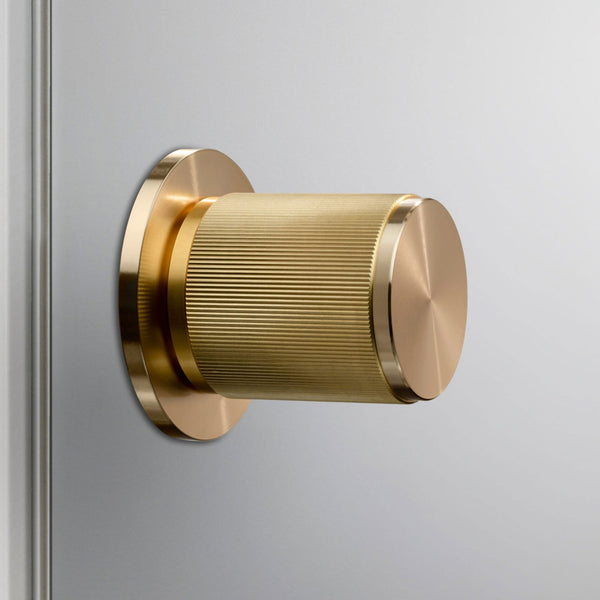 Linear Knurled Door Knob Set In Brass