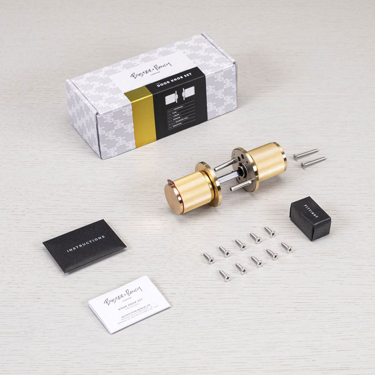 Linear Knurled Door Knob Set In Brass