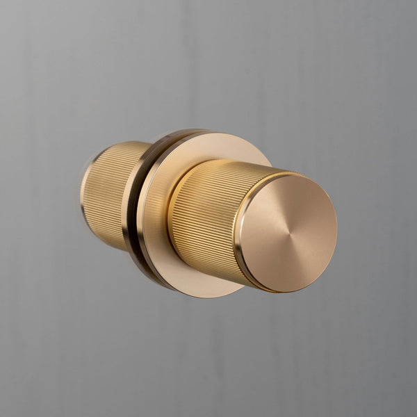 Linear Knurled Fixed Double Sided Door Knob In Brass
