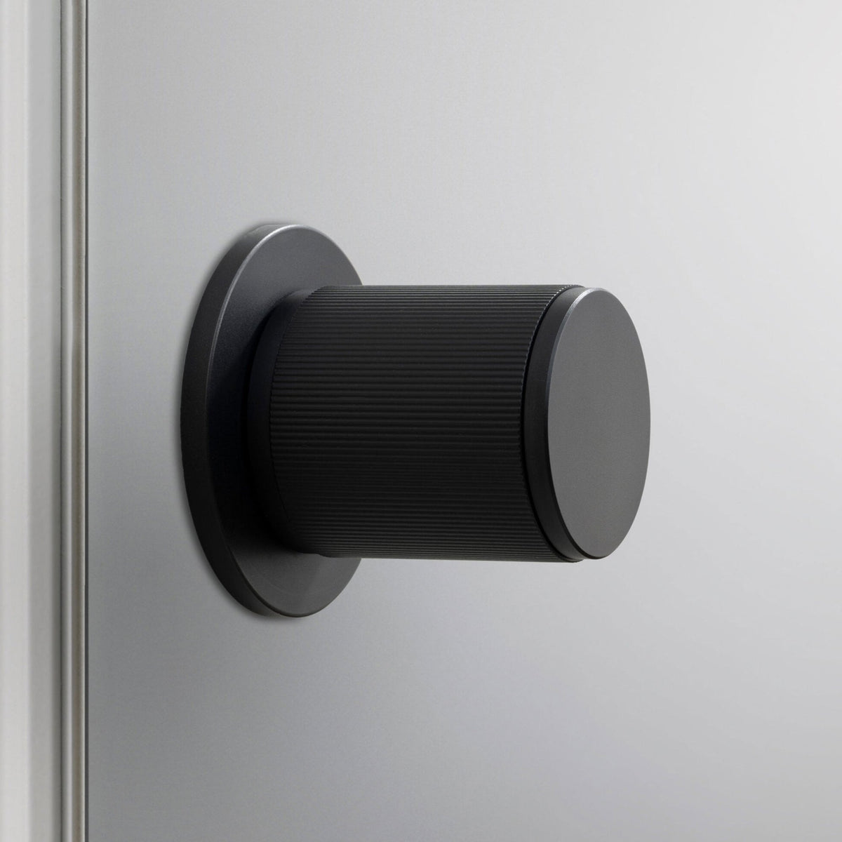 Linear Knurled Fixed Double Sided Door Knob In Welders Black